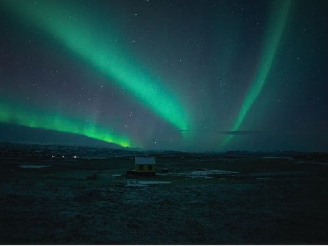 Northern Lights Small Group Tour with Hot Cocoa & Free Photos