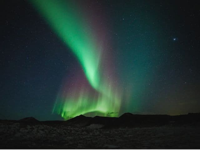 Northern Lights Small Group Tour with Hot Cocoa & Free Photos