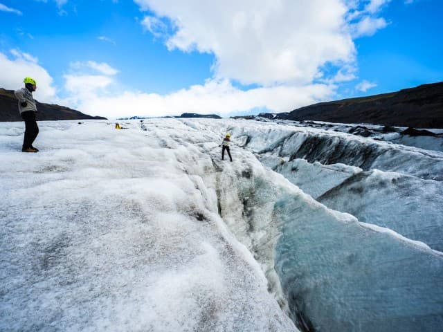 Glacier Hike, South Coast Waterfalls & Black Sand Beach | Iceland